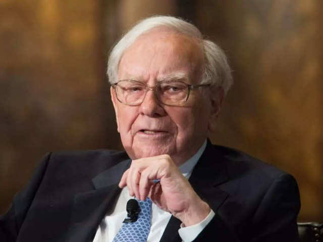 Warren Buffett’s firm reports $12.8 billion loss 1 Warren