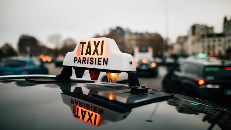 French Taxi Drivers Demand Government Compensation Amid Olympic Games Disruptions 1 French Taxi Drivers
