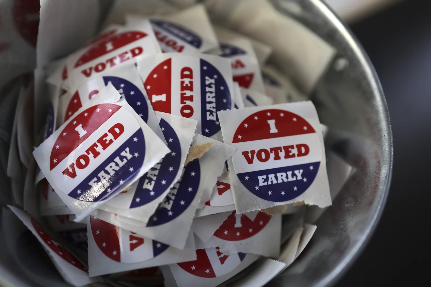 Americans Begin Early In-Person Voting Ahead of Crucial Presidential Election 1 Americans